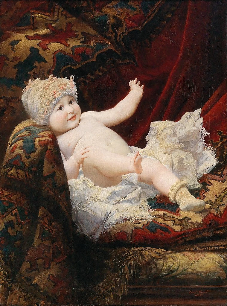 Ritratto di un bambino con cuffia di pizzo